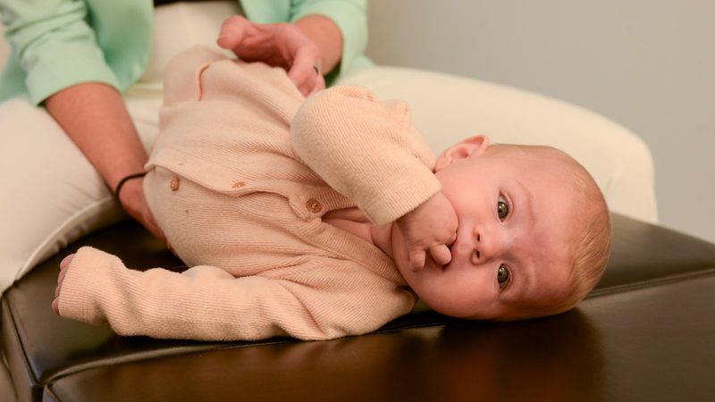 An infant being checked at Mequon Family Chiropractic